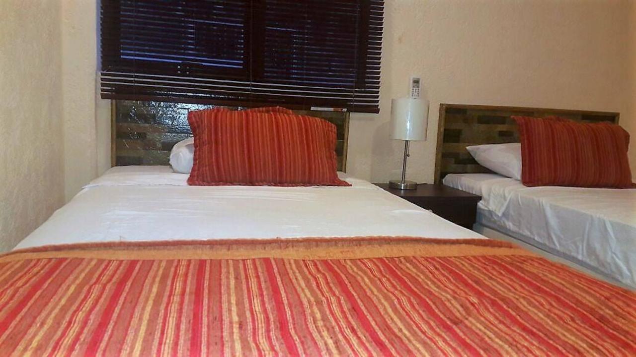 Hotel Versalles Suites Канкун Экстерьер фото