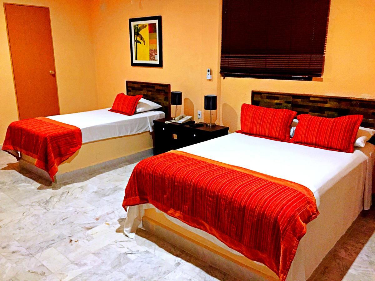 Hotel Versalles Suites Канкун Экстерьер фото
