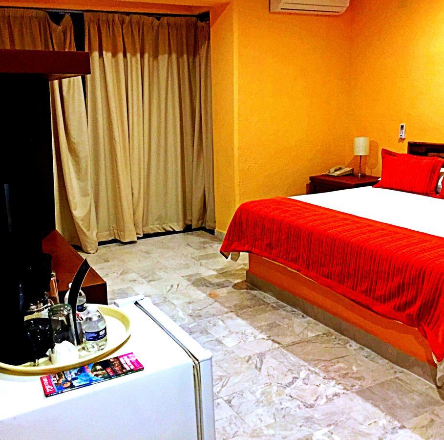 Hotel Versalles Suites Канкун Экстерьер фото