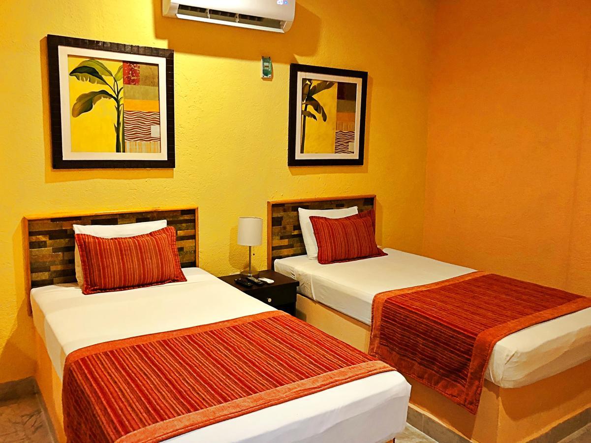Hotel Versalles Suites Канкун Экстерьер фото