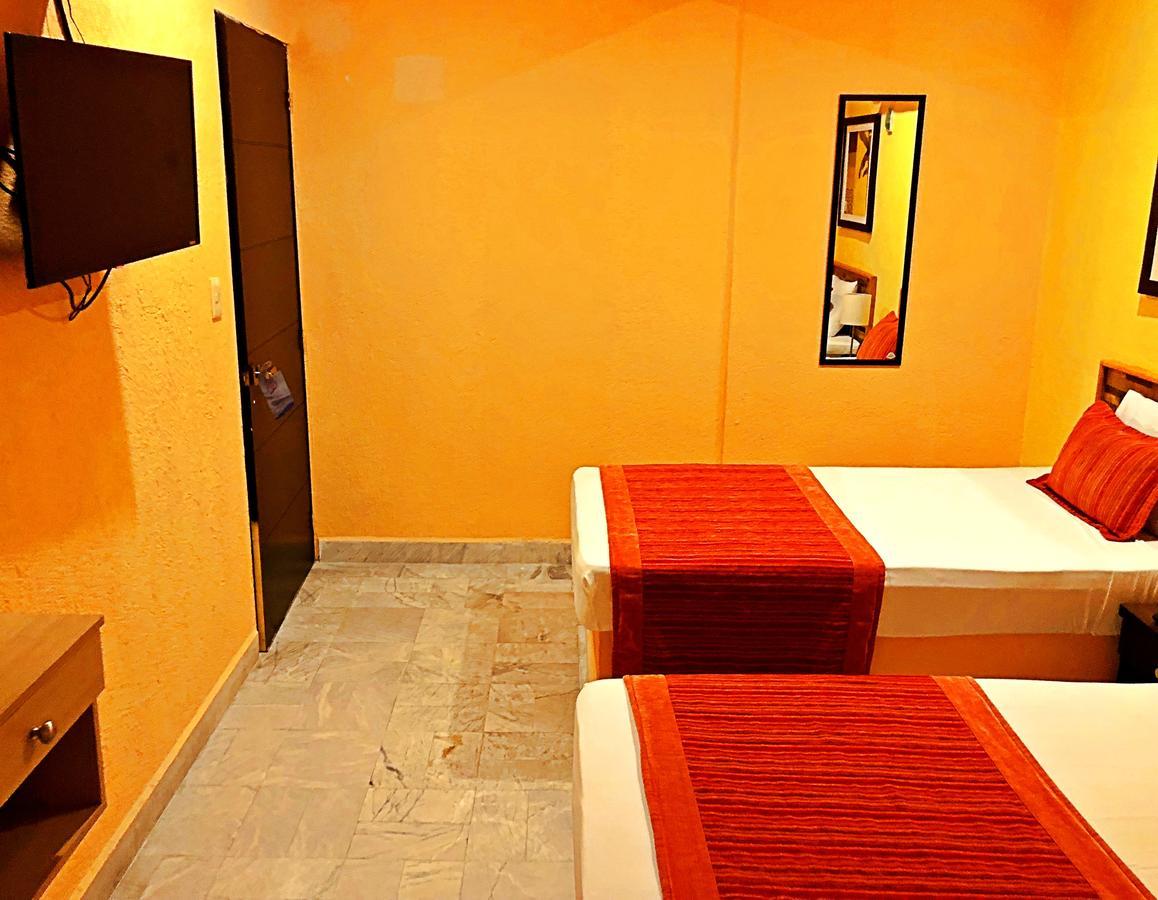 Hotel Versalles Suites Канкун Экстерьер фото